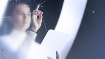 Large transparent presentation screen in a research center